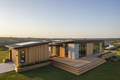 Hybrid 4-module plus site-built garage and deck